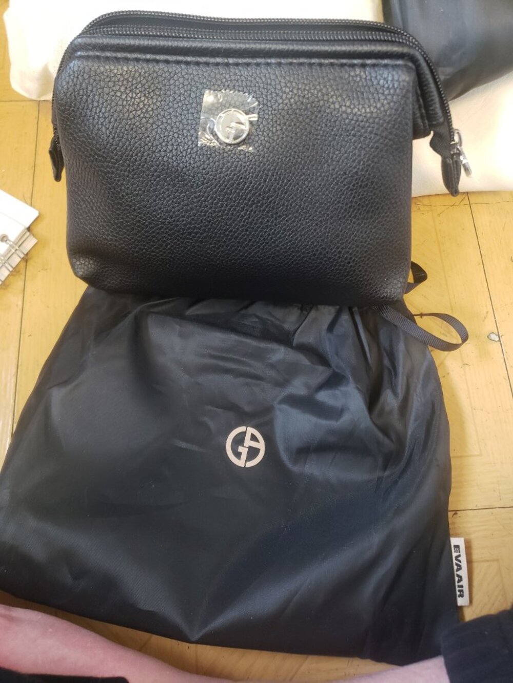 3 bags of items from Eva Air Upgrade for sleeping